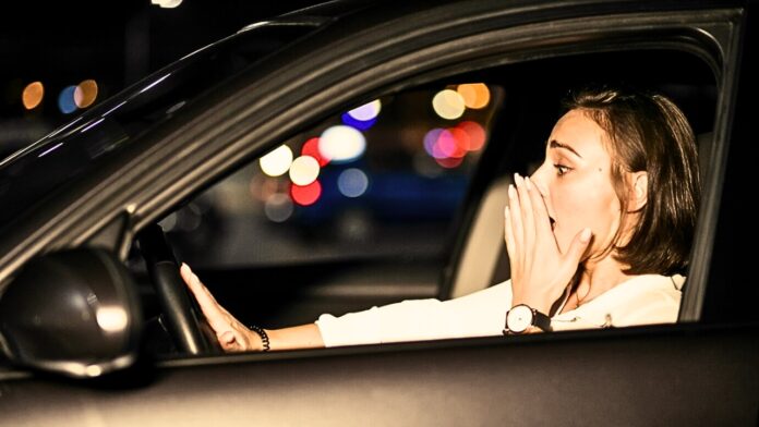 women in car